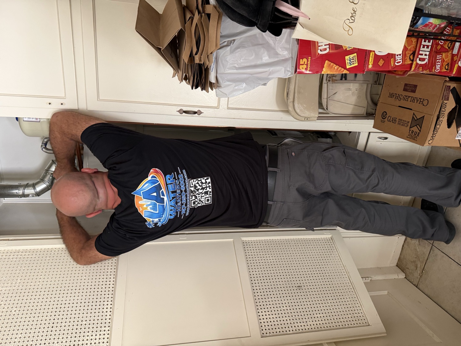 LA Water Heaters technician servicing a water heater
